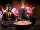 buddah with candle and incense Wall Mural