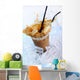 Cold coffee drink with ice and splashes Wall Mural