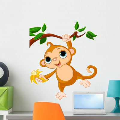 Baby Monkey Tree Wall Decal shown on a wall
