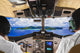 Pilots in the plane cockpit and island Wall Mural