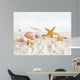 Starfish and seashells  at the beach Wall Mural