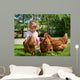 Girl Feeding Chickens