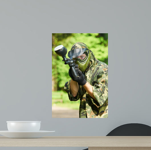 Aiming Paintball Player