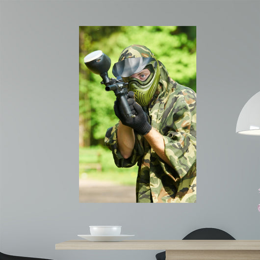Aiming Paintball Player