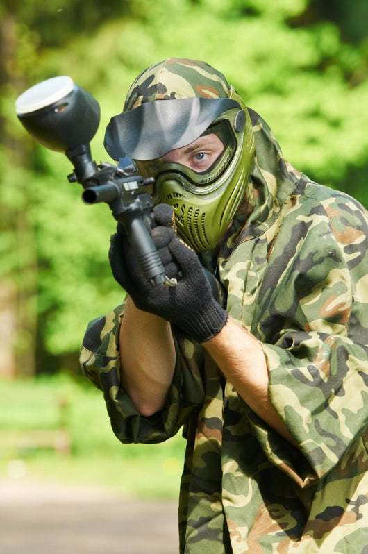 Aiming Paintball Player