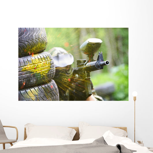 Paintball Player under Gunfire