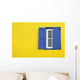 Colorful yellow house with blue shutters in Governor's Harbour Wall Mural