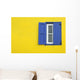 Colorful yellow house with blue shutters in Governor's Harbour Wall Mural