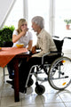 Caregiver Feeding Disabled Woman Wall Decal