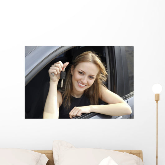 Happy Woman Showing Key Wall Decal