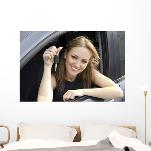 Happy Woman Showing Key Wall Decal