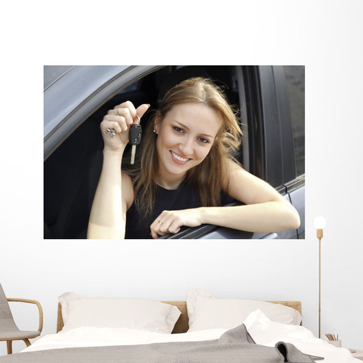 Happy Woman Showing Key Wall Decal