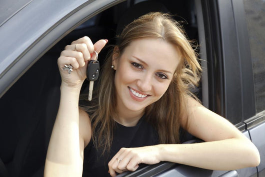Happy Woman Showing Key Wall Decal