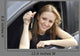 Happy Woman Showing Key Wall Decal