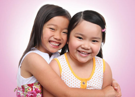 Two Asian Young Sisters Wall Decal