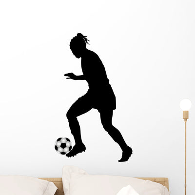 Silhouette Women's Football Wall Decal Design 1 shown on a wall