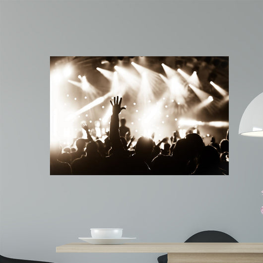 hands raised by the crowd at a live music concert Wall Mural