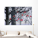 Bullfinches on trees in winter city Wall Mural
