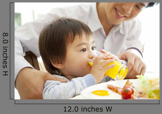 Boy Drinking Orange Juice