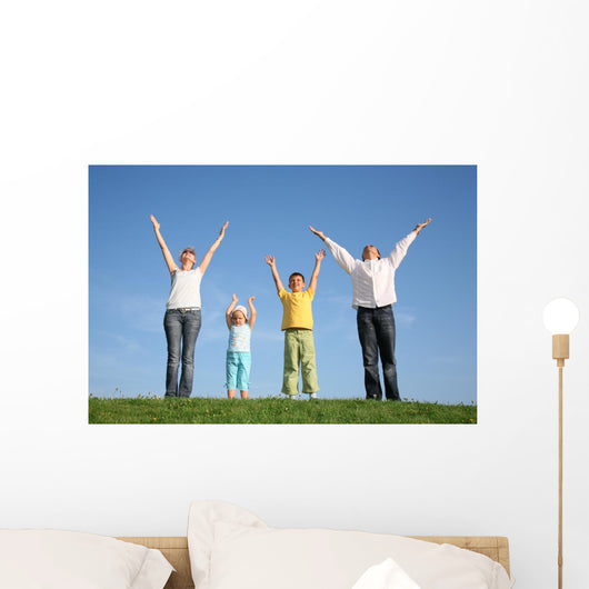 family  with hands up Wall Mural