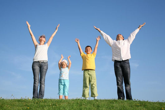 family  with hands up Wall Mural