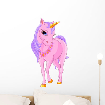 Beautiful Pink Unicorn Wall Decal shown on a wall