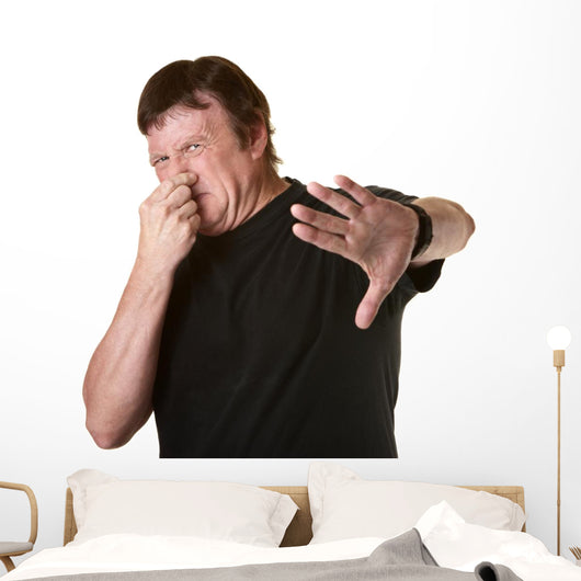 Man Pinches His Nose