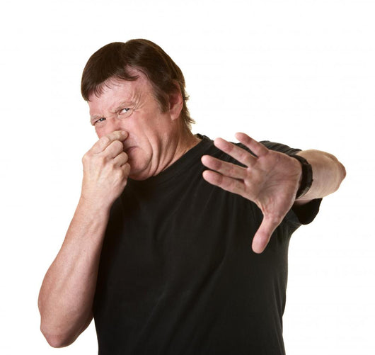Man Pinches His Nose