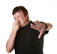 Man Pinches His Nose