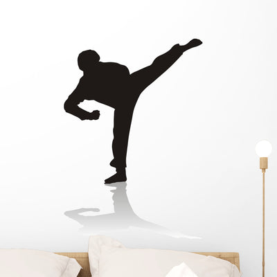 Silhouette Martial Arts Wall Decal shown on a wall