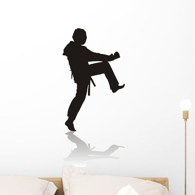 Silhouette Martial Arts Wall Decal shown on a wall