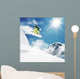 Snowboarder at jump inhigh mountains Wall Mural