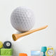Golf ball with tee isolated on white Wall Decal