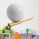 Golf ball with tee isolated on white Wall Decal