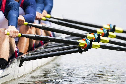 Close up of men's rowing team Wall Mural