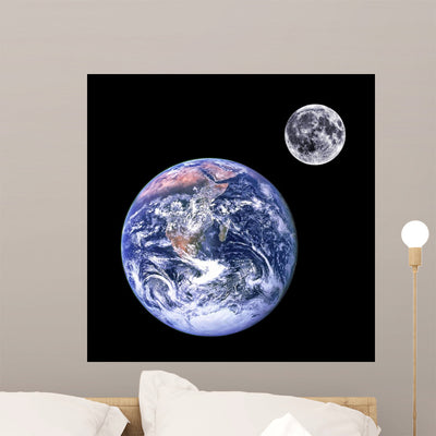 Moon and Earth Wall Mural shown on a wall