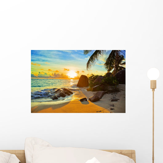 Tropical beach at sunset Wall Mural