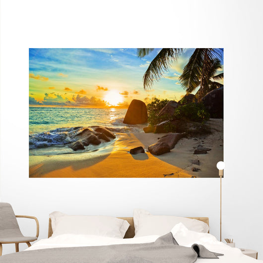 Tropical beach at sunset Wall Mural