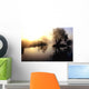 dramatic sunrise over a misty lake at dawn Wall Mural