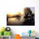 dramatic sunrise over a misty lake at dawn Wall Mural