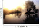 dramatic sunrise over a misty lake at dawn Wall Mural