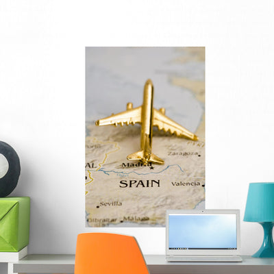 Spain Gold Airplane Wall Mural shown on a wall
