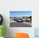 a number of airline aeroplanes at a busy airport Wall Mural
