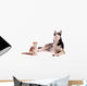 young cat with young dog Husky looking up Wall Decal