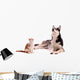 young cat with young dog Husky looking up Wall Decal
