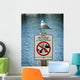 Seagull Perched Atop Wildlife Sign Wall Mural