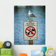 Seagull Perched Atop Wildlife Sign Wall Mural