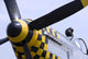 A leather flying helmet atop the cockpit of a P-51 Mustang. Wall Mural
