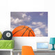 Orange Basketball against Cloudy Wall Mural