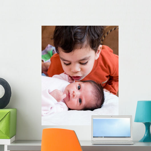 Young Boy Talking to His Newborn Sister Wall Mural